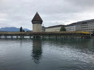 Historic city center of Lucerne with famous Chapel Bridge on Reuss River in Switzerland