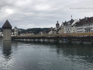 Historic city center of Lucerne with famous Chapel Bridge on Reuss River in Switzerland