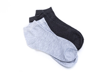 two pairs of colored short socks on a white background, top view