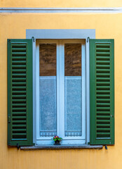 Traditional Italian houses window in Citta Alta of Bergamo City