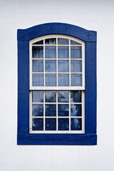 Blue colonial window in Ritapolis, Minas Gerais, Brazil