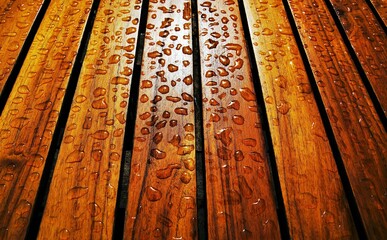 Raindrops on a wooden table
