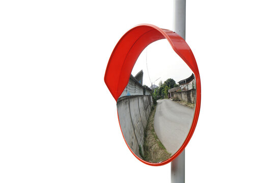 The traffic curve mirror, convex mirror on the road for safety isolated on white background with clipping path. The virtual image is upright, smaller than the object.