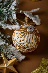 Close up of Vintage golden Christmas bauble, holiday concept