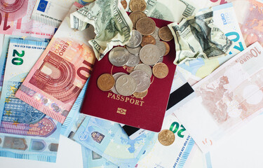 Cash on table isolated: dollars, euro, rubl broken money. All in mess, global crisis . passport travel concept