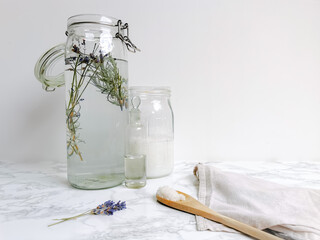 Plastic free DIY laundry products made from soda crystals, vinegar and lavender oil such as fabric softener and detergent