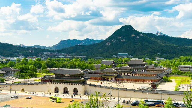 Time lapse,Aerial view of Gyeongbokgung Palace in autumn at.In Seoul South Korea And blue sky and white clouds