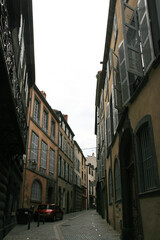 street and residential buildings in clermont-ferrand in auvergne (france)