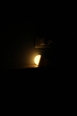 Fototapeta na wymiar A lamp to illuminate a dark room