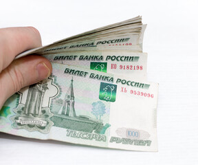 Scattered Russian 1000 rubles banknotes closeup