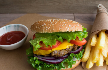 Delicious fresh homemade burger with french fries on the side