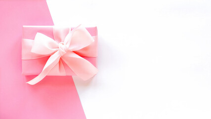 A gift box on two-color background