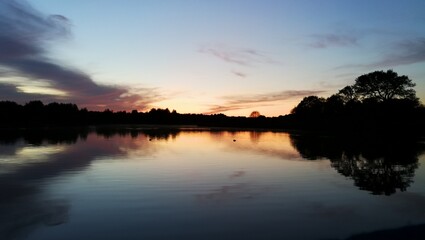 sunset reflected on lake 