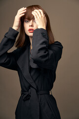 Romantic woman European appearance black coat cropped view