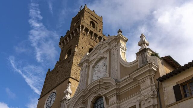 Timelapse of the Pitigliano cathedral. The bell tower of the Cathedral of Saints Peter and Paul in Pitigliano. Pitigliano, Tuscany, Italy, Europe