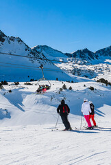 Ski resort GrandVallira. Views of the Pyrenees mountains. Ski cabins with skiers. Rest with the whole family and friends.