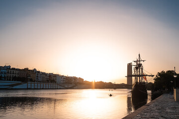 Seville, Spain; July 1 2020. Panoramic sunset of the Guadalquivir River in Seville