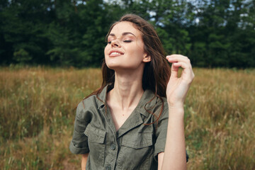 Woman with closed eyes and nature fresh air 