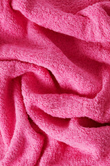 Fluffy curled pink towel texture