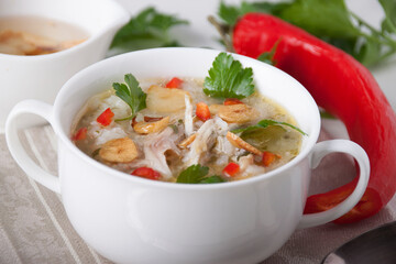 Chicken soup with rice  and chili