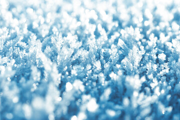 White hoarfrost crystals on flat surface closeup view	
