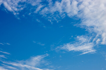 Beautiful sunny blue sky with flying cloud
