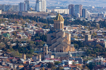 Fototapeta na wymiar View of Tbilisi with Sameba, Trinity Church and other landmarks