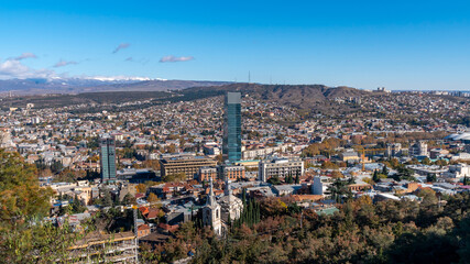 Panorama view of Tbilisi. Modern landmark - high-rise hotel