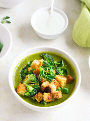 Healthy broccoli green pea soup