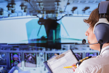 Woman airline pilot wearing uniform with epauletes