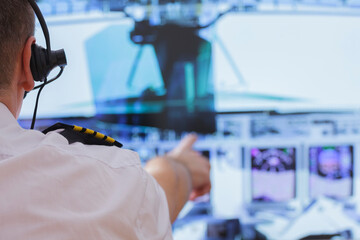 Airline pilot wearing uniform with epauletes