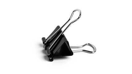 Black metal binder clips on white background. High quality photo