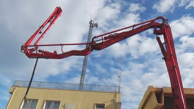 Concrete Pump Crane Arm against Blue Sky