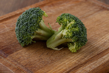  A lot of broccoli for diet and healthy eating. Fresh green broccoli on a   table.Broccoli...