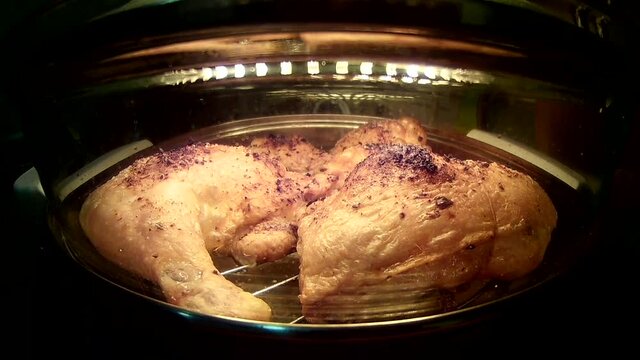 Time-lapse in dark. Grill turkey legs