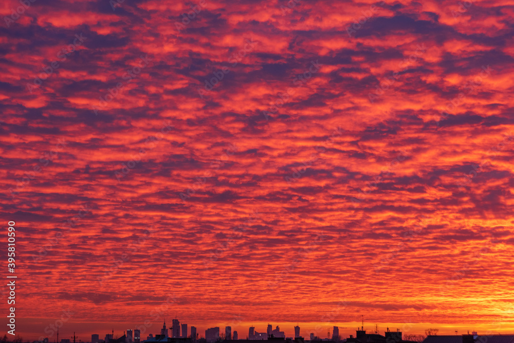 Wall mural the view of the sky with different states of nature, at dawn and at dusk with dramatic red clouds, s