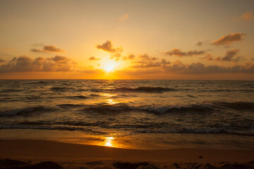 Fototapeta na wymiar Sunset on the beach of the Tyrrhenian sea in Tuscany, Italy,