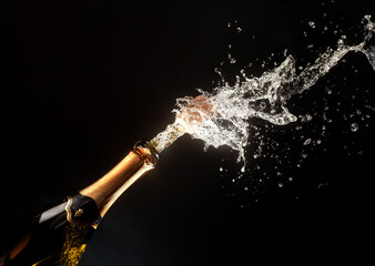 Valentine's day and Happy New Year theme with splashing champagne © yurchello108
