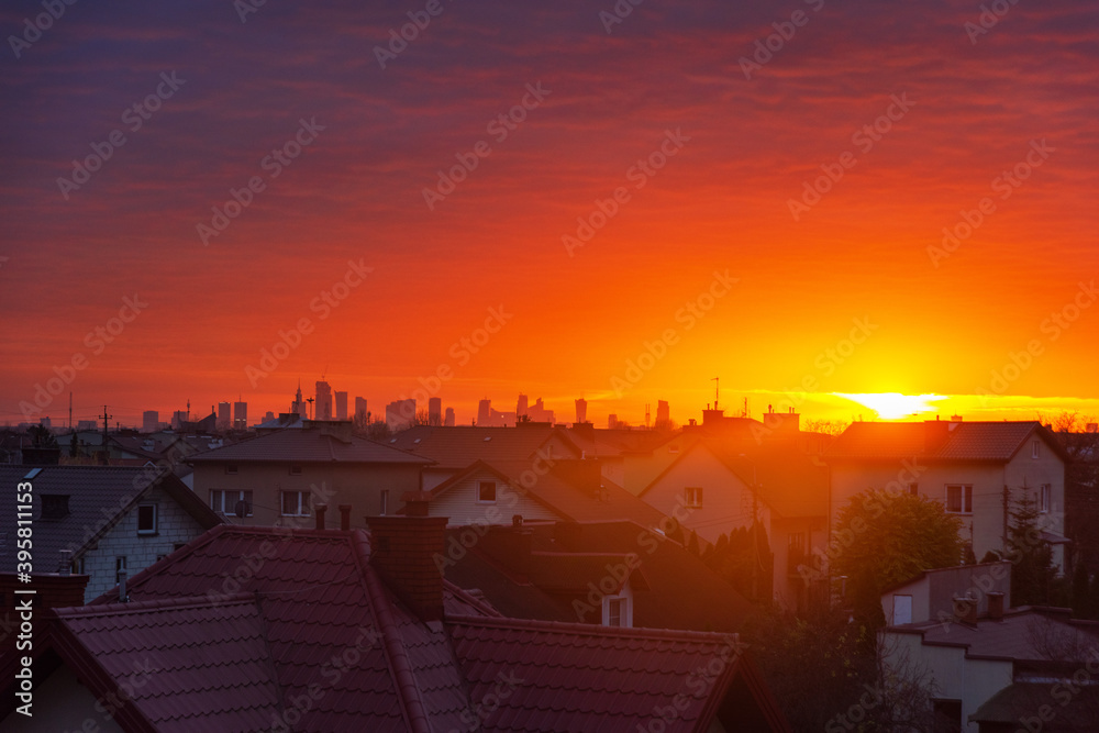 Wall mural the view of the sky with different states of nature, at dawn and at dusk with dramatic red clouds, s
