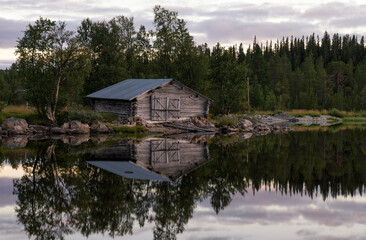 Fototapeta na wymiar Boathouse on a Swedish lake