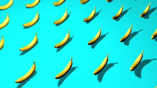 Minimal zine 3d bananas spinning on sky blue background. Tropical  or summer collage with fruit pattern. Stop Motion 4k animation.