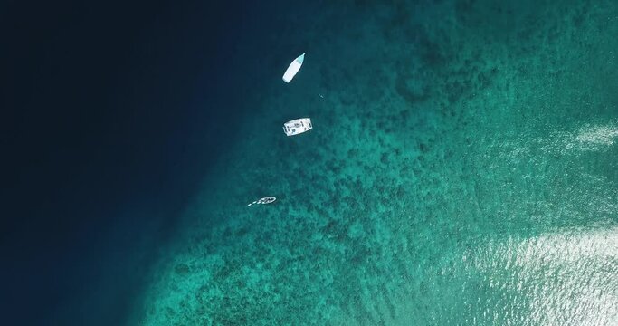 Aerial view of a boat near Huraa, North Male Atoll, Maldives, Indian Ocean . High quality 4k footage