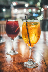 Two freshly served cocktail glasses, ready to celebrate.