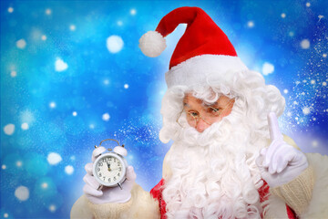 elderly santa claus in a suit, with a white beard congratulates children and adults, shows with his hands, the concept of christmas, childhood, festive mood, congratulations, good wishes