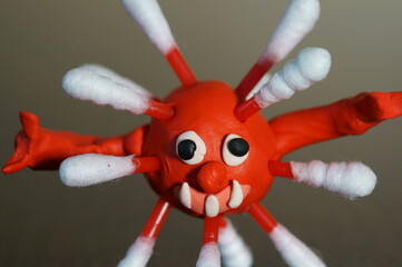 The figure of the virus on the table.