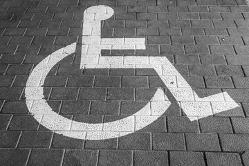 Disability Parking Sign on the Pavement.