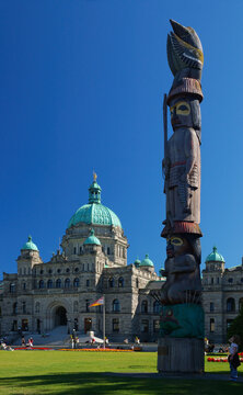 Totem Pole And BC Parliament Buildings Victoria Portrait