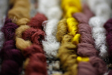 Texture and color details of sewing threads