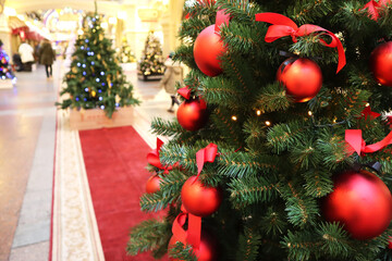 Christmas tree with new year decorations. New Year celebration. Selective soft focus. Background for postcards