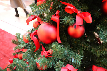 Christmas tree with new year decorations. New Year celebration. Selective soft focus. Background for postcards